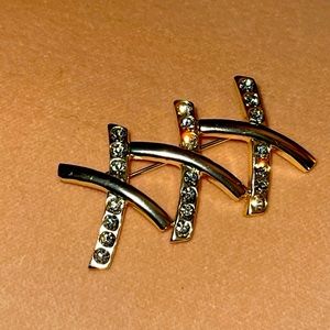 Vintage triple  “X”/Kiss brooch/pin with clear rhinestones in silvertone.